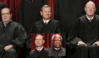 The justices of the U.S. Supreme Court gather for a group portrait at the Supreme Court Building in Washington, Friday, Oct. 8, 2010. : Associate Justice Antonin Scalia, Chief Justice John G. Roberts, Associate Justice Anthony M. Kennedy. Inset:  Associate Justice Samuel Alito Jr., Associate Justice Clarence Thomas (AP Photo/Pablo Martinez Monsivais)