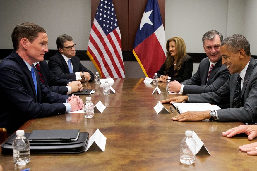 President Obama met with Texas Gov. Rick Perry on Wednesday but declined his offer to go to the Mexico border just 500 miles away. (Associated Press)