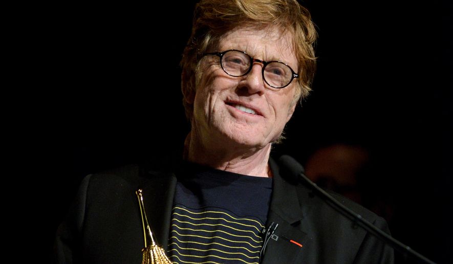 FILE - This Feb. 7, 2014 file photo shows Robert Redford at the 2014 Santa Barbara International Film Festival&#39;s American Riviera Award ceremony in Santa Barbara, Calif. Redford will play Dan Rather in a film about the CBS anchor’s disputed report about President George W. Bush’s National Guard service during the Vietnam War.  The film, titled “Truth,” will be adapted from the memoir “Truth And Duty: The Press, The President, And The Privilege Of Power” by CBS producer Mary Mapes. Cate Blanchett is signed on to play Mapes. (Photo by Richard Shotwell/Invision/AP, File)