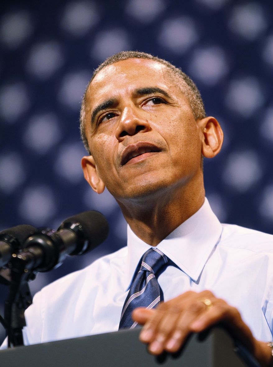 President Barack Obama speaks on the economy at the Paramount Theatre in Austin, Texas, Thursday July 10, 2014. (AP Photo/The Dallas Morning News, Kye R. Lee, Pool)