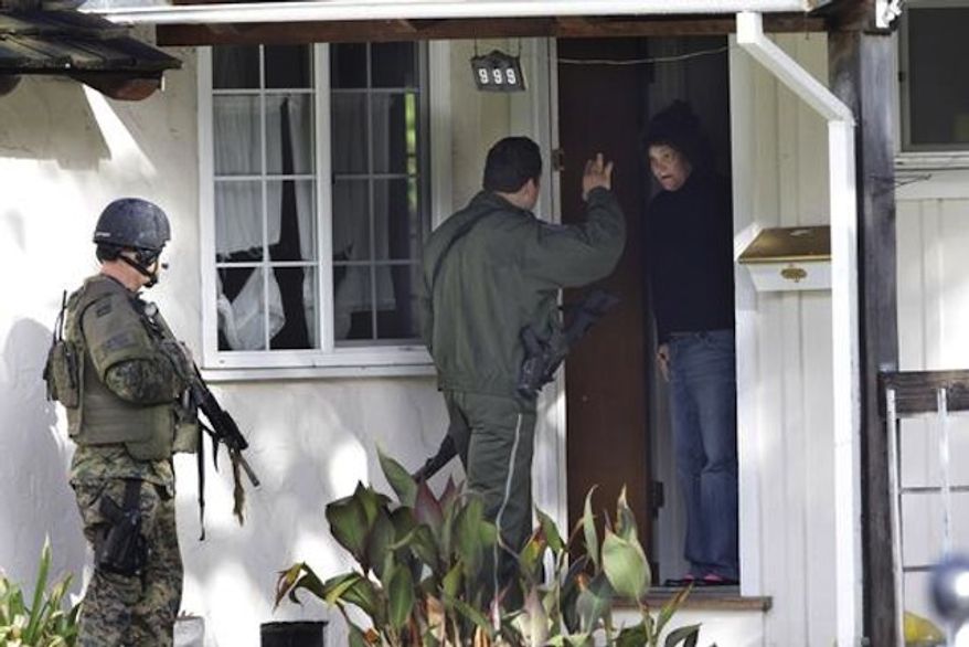 **FILE** Several officers with the Durham Police Department lied about 911 hangup calls to convince residents to consent to searches of their homes. (Associated Press/Paul Sakuma)