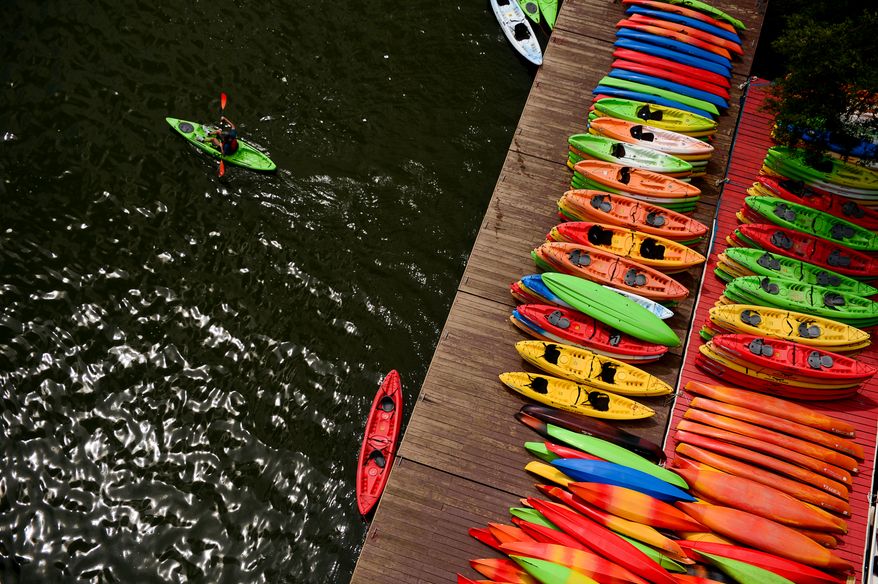 The popularity of kayaking and other outdoors sports help some cities recover from the recession. (Andrew Harnik/The Washington Times)