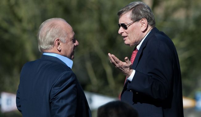 **FILE** Major League Baseball commissioner Bud Selig, right, talks with Baltimore Orioles owner Peter Angelos, left, after the MLB owners meeting in Paradise Valley, Ariz., Thursday Jan. 15, 2009. (AP Photo/Aaron J. Latham