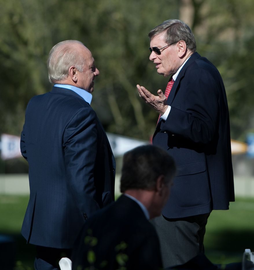 **FILE** Major League Baseball commissioner Bud Selig, right, talks with Baltimore Orioles owner Peter Angelos, left, after the MLB owners meeting in Paradise Valley, Ariz., Thursday Jan. 15, 2009. (AP Photo/Aaron J. Latham