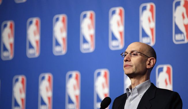 **FILE** NBA Commissioner Adam Silver speaks at a news conference during the NBA board of governors meeting in Las Vegas on July 15, 2014. (Associated Press)