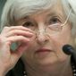 Federal Reserve Chair Janet Yellen removes her glasses as she testifies on Capitol Hill in Washington, Wednesday, July 16, 2014, before the House Financial Services Committee hearing entitled: &quot;Monetary Policy and the State of the Economy.  (AP Photo/Pablo Martinez Monsivais)