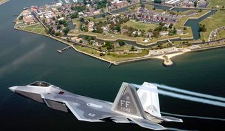 ** FILE ** Lt. Col. James Hecker flies over Fort Monroe before delivering the first operational F-22A Raptor to its permanent home at Langley Air Force Base, Va., on May 12, 2005 (U.S. Air Force) 