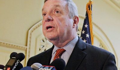 Sen. Richard J. Durbin, Illinois Democrat, said the attorney general&#x27;s decision on federal benefits for same-sex couples is &quot;logical, consistent and compassionate.&quot; (associated press photographs)