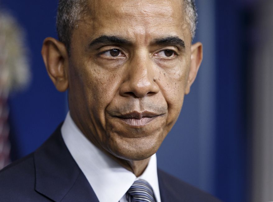 ** FILE ** President Obama speaks in the Brady Press Briefing Room of the White House in Washington, July 18, 2014 (AP Photo/J. Scott Applewhite)