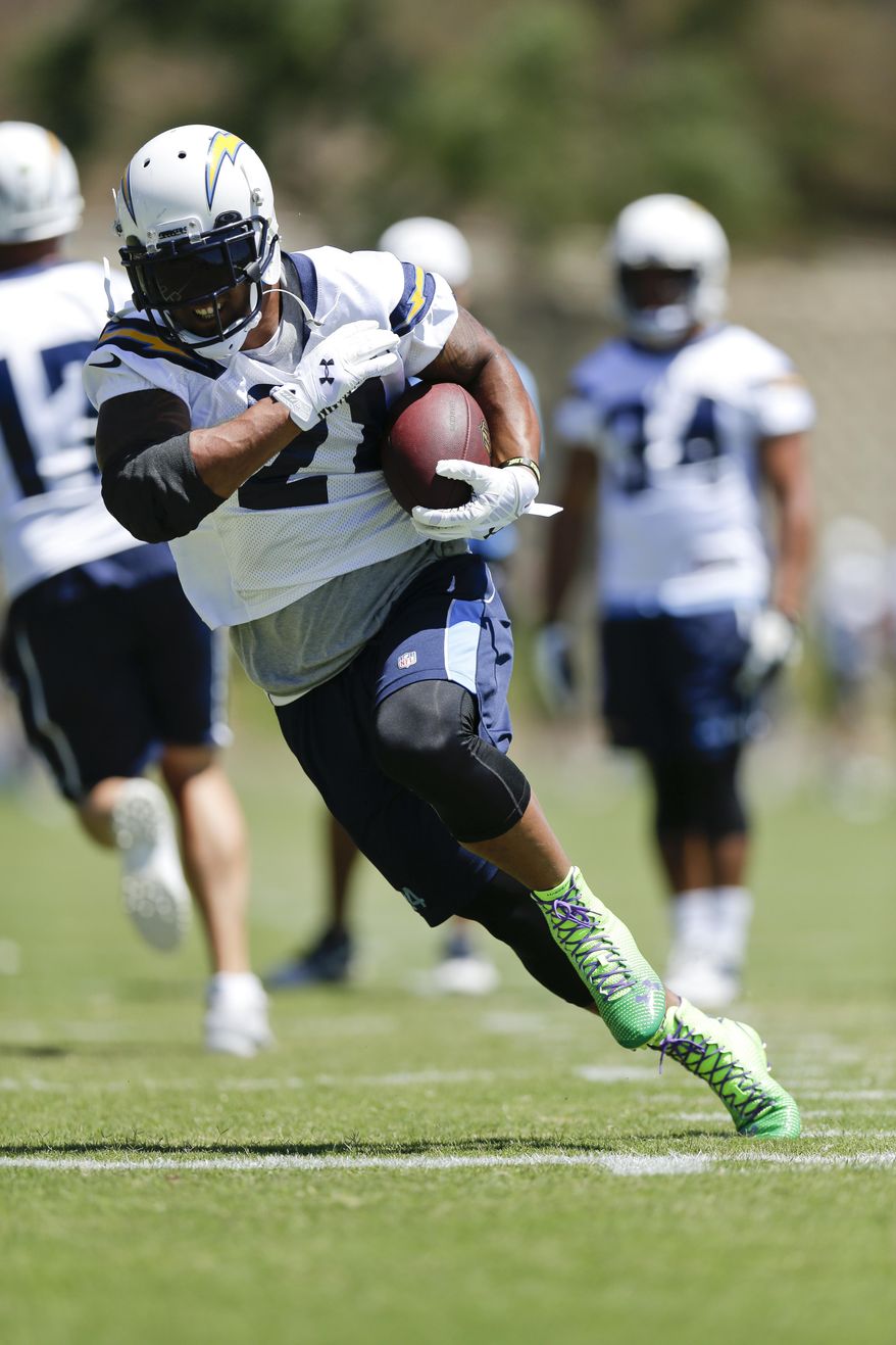 FILE - In this June 17, 2014 file photo, San Diego Chargers running back Ryan Mathews heads upfield during NFL football minicamp at the team's facility in San Diego. This could be a pivotal year for running back Mathews, who enters the final season of a five-year contract he signed after the Chargers drafted him in the first round to replace LaDainian Tomlinson. (AP Photo/Gregory Bull, File)