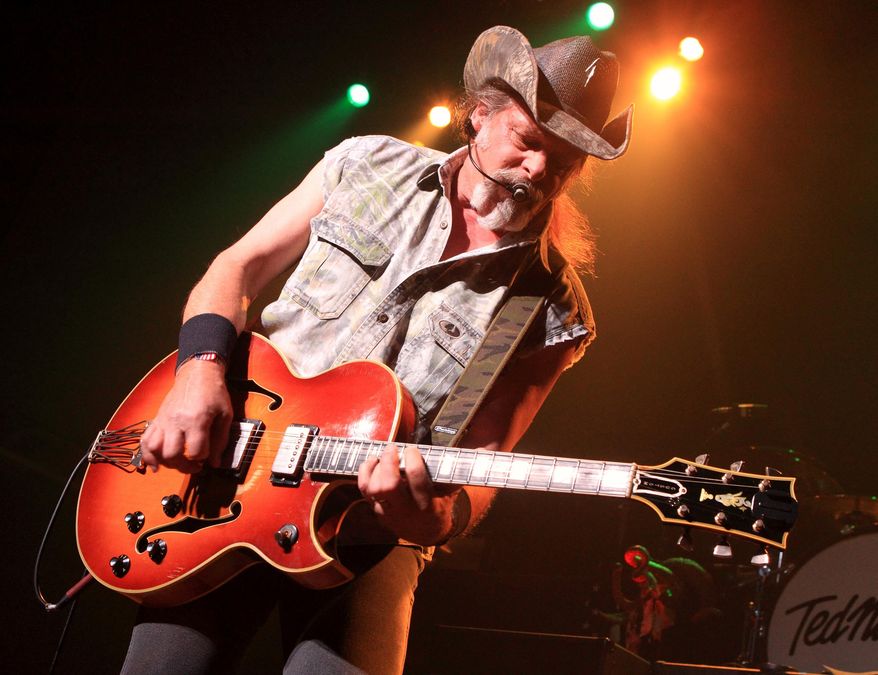 This Aug. 16, 2013, file photo shows Ted Nugent performing at Rams Head Live in Baltimore. (Photo by Owen Sweeney/Invision/AP, File)