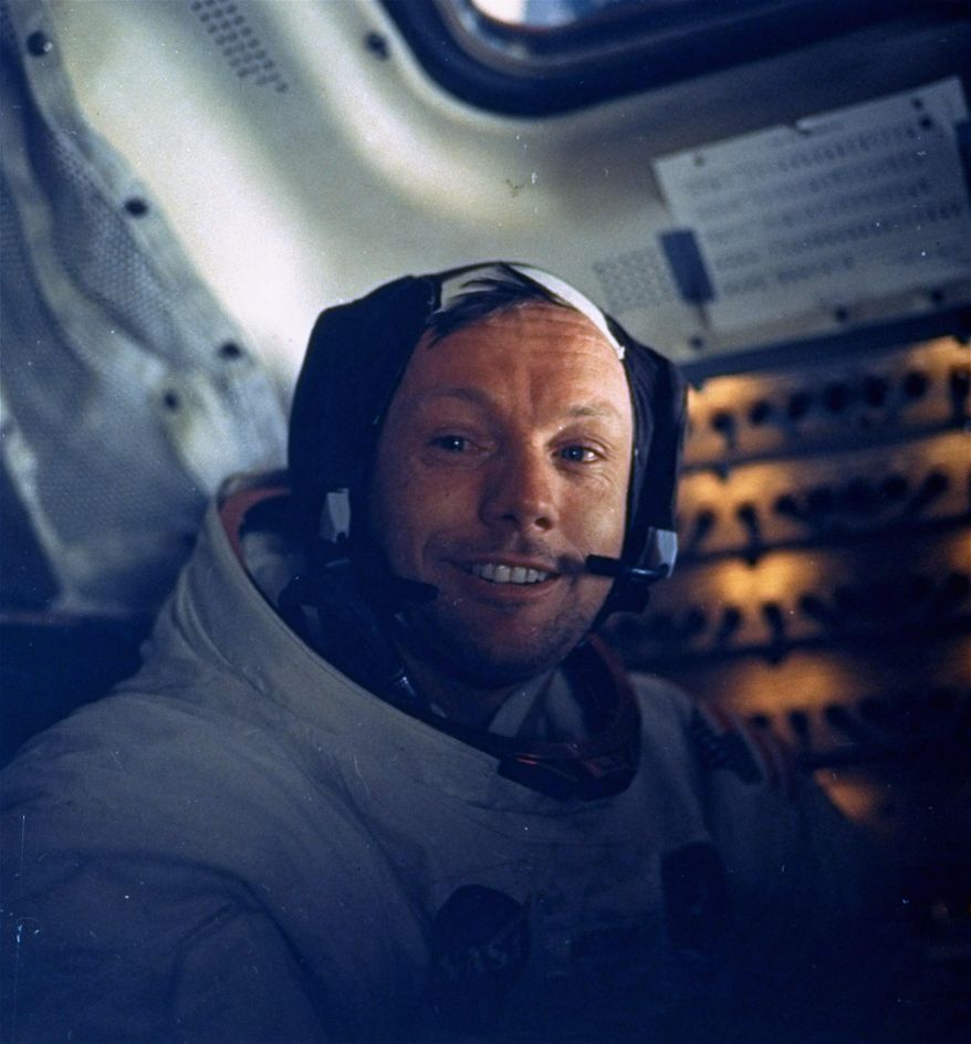 ** FILE ** In this July 20, 1969, file photo provided by NASA, astronaut Neil A. Armstrong, Apollo 11 commander, smiles for a photo inside the Lunar Module while it rested on the lunar surface. Armstrong was first out the lunar module, Eagle, onto the dusty surface of Tranquility Base. (AP Photo/NASA, File)