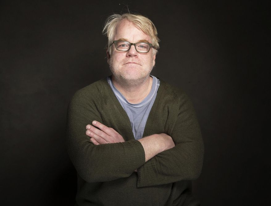 FILE - In a Jan. 19, 2014 file photo Phillip Seymour Hoffman poses for a portrait at The GenArt Quaker Good Energy Lodge Powered by CEG, during the Sundance Film Festival in Park City, Utah. Court documents filed July 18, 2014 show Hoffman rejected his accountant's suggestion he set aside money for his three children because he didn't want them to be "trust fund" kids. (Photo by Victoria Will/Invision/AP)