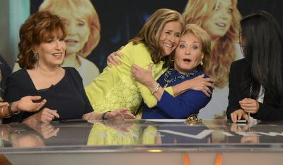 This image released by ABC shows, from left, Joy Behar, Meredith Vieira and Barbara Walters on the set of the daytime talk series &amp;quot;The View,&amp;quot; Thursday, May 15, 2014 in New York. (AP Photo/ABC, Ida Mae Astute)