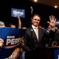 After winning Tuesday&#39;s Republican primary , businessman David Perdue immediately turned his focus to his Democratic rival Michelle Nunn, painting her as an Obama ally and saying she has to &quot;defend the failed policies of the last six years.&quot; (Associated Press Photographs)