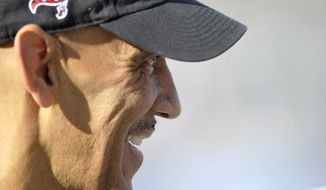 Former NFL head coach Tony Dungy during the Pro Football Hall of Fame exhibition NFL football game between the Dallas Cowboys and the Miami Dolphins Sunday, Aug. 4, 2013, in Canton, Ohio. The Cowboys defeated the Dolphins, 24-20. (AP Photo/David Richard)