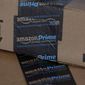 This June 4, 2014 photo shows Amazon.com boxes in Phoenix. Amazon reports quarterly financial results on Thursday, July 24, 2014. (AP Photo/Ross D. Franklin)