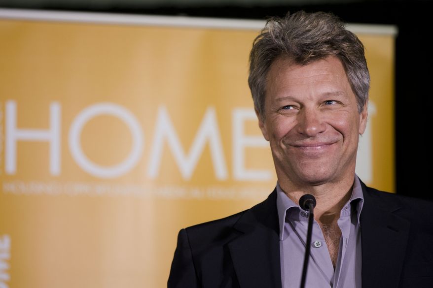 FILE - This April 22, 2014 file photo shows musician and humanitarian Jon Bon Jovi during the grand opening of the JBJ Soul Homes in Philadelphia. Jon Bon Jovi will be honored with an award named for an opera singer. The Marian Anderson Award is given in Philadelphia to “critically acclaimed artists who have impacted society in a positive way.” In announcing the recipient Wednesday, July 23, organizers said Bon Jovi has used his musical success to support groups working to end homelessness and hunger. Bon Jovi will accept the $25,000 award on Nov. 18 at the city’s Kimmel Center for the Performing Arts. Anderson was a celebrated contralto and Philadelphia native who in 1955 became the first black soloist at the Metropolitan Opera in New York. She died in 1993 at the age of 96. (AP Photo/Matt Rourke, File)