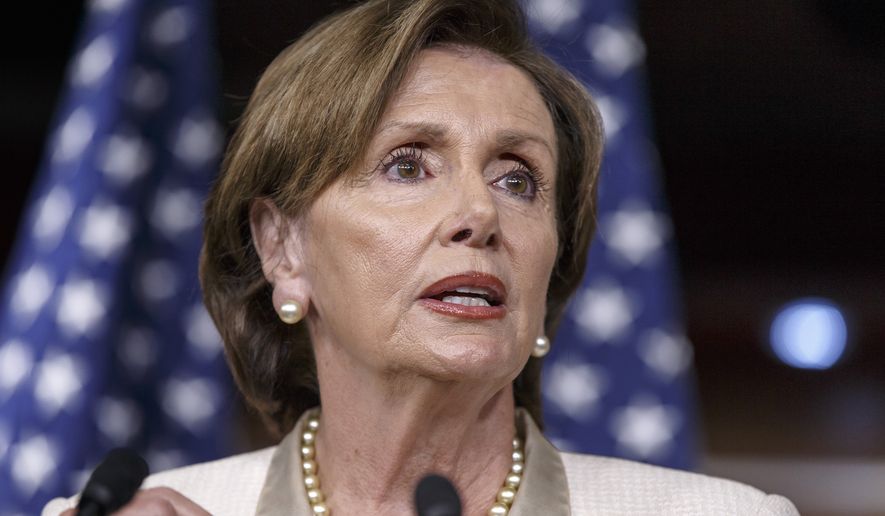 House Minority Leader Nancy Pelosi of Calif., takes questions from reporters on Capitol Hill in Washington, Friday, July 25, 2014. (AP Photo) ** FILE **