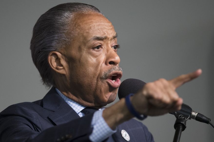 The Rev. Al Sharpton speaks during a rally for Eric Garner at the National Action Network headquarters, Saturday, July 26, 2014, in New York. (AP Photo/John Minchillo)