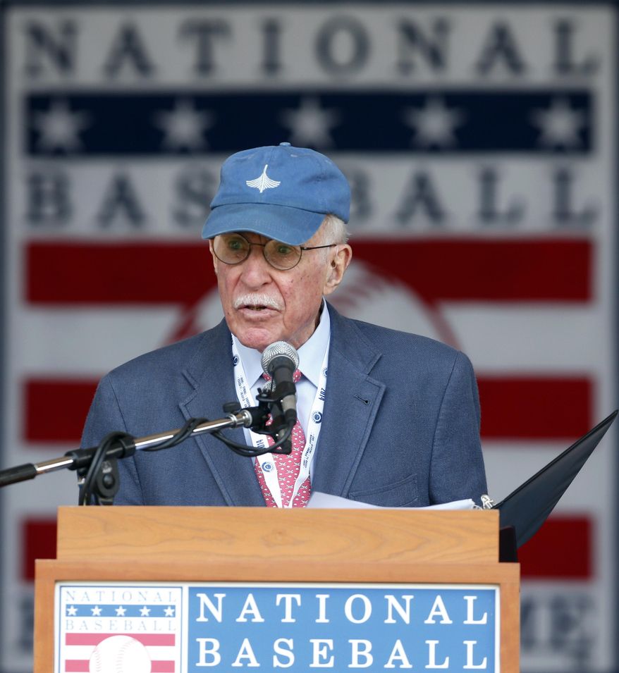 Roger Angell of The New Yorker speaks after receiving the J.G. Taylor Spink Award during a ceremony at Doubleday Field on Saturday, July 26, 2014, in Cooperstown, N.Y.  (AP Photo/Mike Groll)