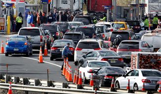 New Jersey state troopers kept order as motorists and pedestrians waited in long lines to purchase gasoline in the paucity following Superstorm Sandy. The storm&#39;s fallout highlighted the need for increased domestic oil reserves. (associated press)