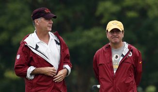 Washington Redskins president and general manager Bruce Allen, left, stands with owner Daniel Snyder during practice at the team&#39;s NFL football training facility, Sunday, July 27, 2014 in Roanoke, Va. (AP Photo/Alex Brandon) **FILE**