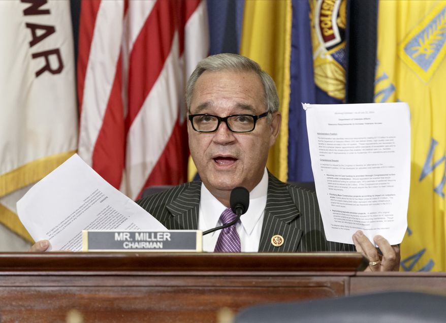 FILE - In this July 24, 2014, file photo, House Veterans Affairs Committee Chairman Jeff Miller, R-Fla., holds up two pages of resource requests from the Department of Veterans Affairs on Capitol Hill in Washington. The chairmen of the House and Senate Veterans Affairs committees have reached a tentative agreement on a plan to fix a veterans' health program scandalized by long patient wait times and falsified records covering up delays. Rep. Jeff Miller, R-Fla., and Sanders scheduled a news conference Monday, July 28, to talk about a compromise plan to improve veterans' care. (AP Photo/File)