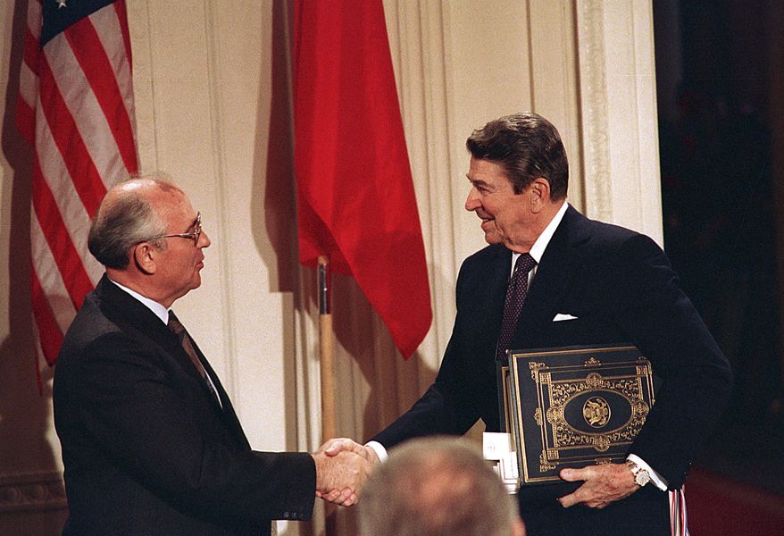 President Reagan and Soviet leader Mikhail Gorbachev signed the Intermediate Range Nuclear Forces Treaty in 1987 to ban missiles with ranges of 310 miles to 3,400 miles. Key members of Congress have told President Obama that Russia is material breach of the treaty. (Associated Press/File)