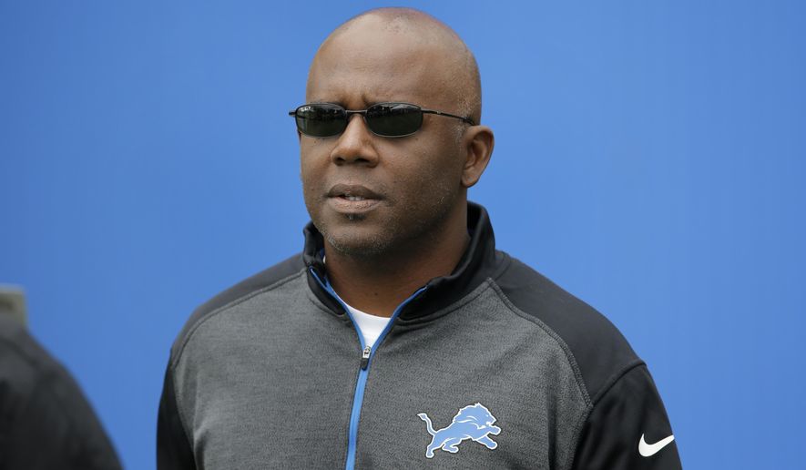 Detroit Lions general manager Martin Mayhew watches during NFL football training camp in Allen Park, Mich., Monday, July 28, 2014. (AP Photo/Paul Sancya)