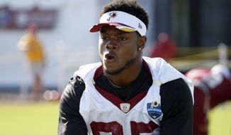 Washington Redskins receiver Leonard Hankerson works with a medicine ball during practice at the team&#39;s NFL football training facility, Monday, July 28, 2014 in Richmond, Va. (AP Photo/Alex Brandon)