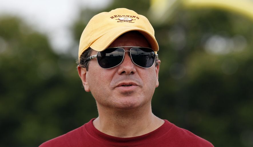Washington Redskins owner Daniel Snyder pauses on the field after practice at the team&#39;s NFL football training facility, Sunday, July 27, 2014, in Richmond, Va. (AP Photo/Alex Brandon) **FILE**