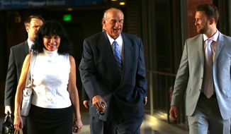 FILE - In this July 22, 2014 file photo former Minnesota Gov. Jesse Ventura, center, arrives at court with his wife, Terry, and others for his defamation lawsuit against &amp;quot;American Sniper&amp;quot; author Chris Kyle in St. Paul, Minn. Kyle wrote in his best-seller that he decked Ventura in a California bar in 2006 after Ventura allegedly said Navy SEALs &amp;quot;deserve to lose a few.&amp;quot; Ventura, a former SEAL and pro wrestler, testified Kyle fabricated the story. Kyle denied that in testimony videotaped before his death last year. (AP Photo/The Star Tribune, Jim Gehrz, File) MANDATORY CREDIT; ST. PAUL PIONEER PRESS OUT; MAGS OUT; TWIN CITIES LOCAL TELEVISION OUT