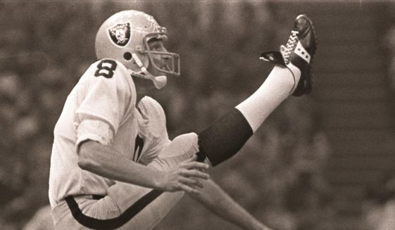 In this Jan. 25, 1981 file photo, Oakland Raiders punter Ray Guy kicks against the Philadelphia Eagles in Super Bowl XV in New Orleans. Those anxious seconds for punt returners awaiting his booming kicks were nothing compared to the more than two decades Guy had to endure before finally getting the call that he was elected to the Pro Football Hall of Fame. (AP Photo/File) **FILE**