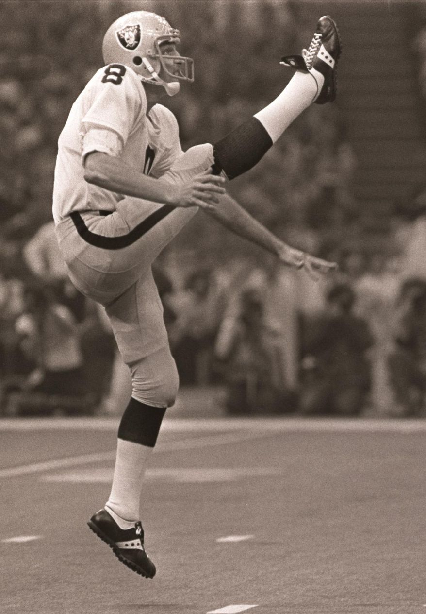 In this Jan. 25, 1981 file photo, Oakland Raiders punter Ray Guy kicks against the Philadelphia Eagles in Super Bowl XV in New Orleans. Those anxious seconds for punt returners awaiting his booming kicks were nothing compared to the more than two decades Guy had to endure before finally getting the call that he was elected to the Pro Football Hall of Fame. (AP Photo/File) **FILE**
