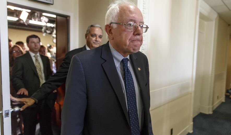 Senate Veterans’ Affairs Committee Chairman Sen. Bernie Sanders, I-Vt., followed by House Veterans’ Affairs Committee Chairman Rep. Jeff Miller, R-Fla., leave the Senate TV studio after a news conference on Capitol Hill, in Washington, Monday, July 28, 2014, about a bipartisan deal to improve veterans&#x27; health care that would authorize at least $17 billion to fix the health program scandalized by long patient wait times and falsified records covering up delays, the bill&#x27;s chief supporters said Monday. (AP Photo/J. Scott Applewhite) ** FILE **