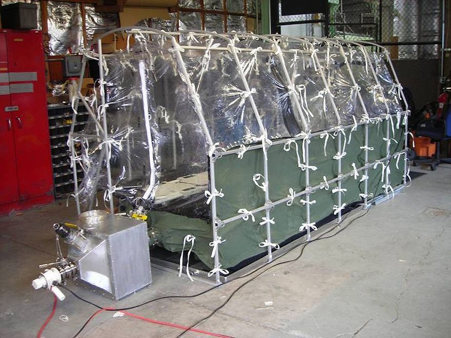 In this undated photo released by the Center for Disease Control, a Aeromedical Biological Containment System which looks like a sealed isolation tent for Ebola air transportation is shown. On Thursday afternoon July 31, 2014, officials at Atlanta's Emory University Hospital said they expected one of the Americans to be transferred there "within the next several days." The hospital declined to identify which aid worker, citing privacy laws. (AP Photo/Center for Disease Control)