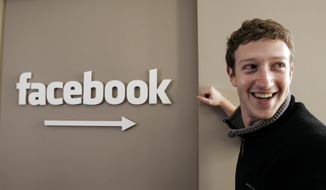Facebook founder Mark Zuckerberg at Facebook headquarters in Palo Alto, California. The social media giant is being sued by a woman who says her ex-boyfriend posted &quot;revenge porn&quot; images of her to Facebook. (AP Photo/Paul Sakuma,File)