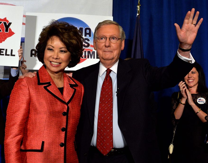 Senate Minority Leader Mitch McConnell is from Kentucky, but a Democratic operative apparently thinks wife Elaine Chao is not. (Associated Press)