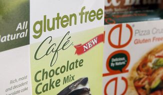 In this Aug. 2, 2013, file photo, a variety of foods labeled Gluten Free are displayed in Frederick, Md., Friday, Aug. 2, 2013. (AP Photo/Jon Elswick, File) **FILE**