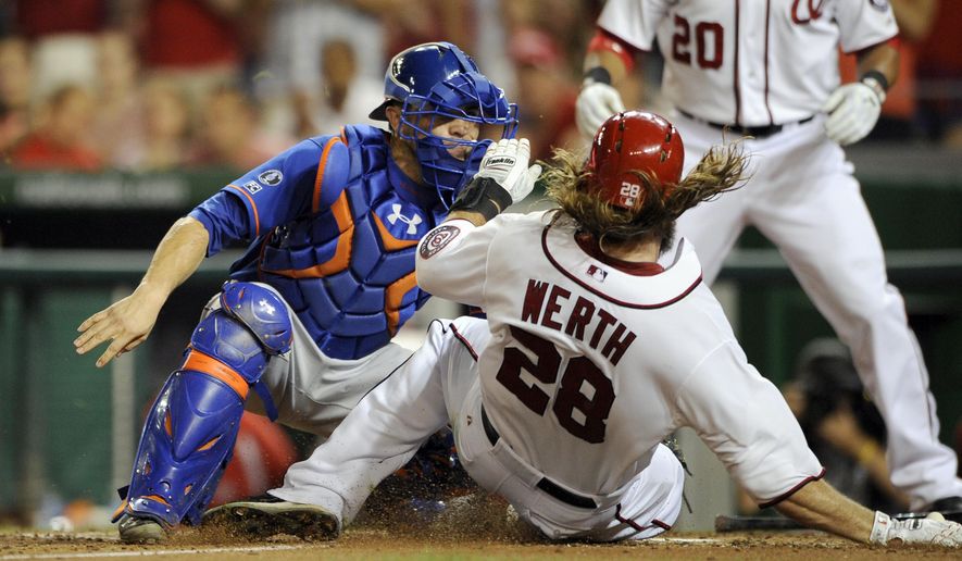 Washington Nationals&#39; Jayson Werth (28) is tagged out at the plate by New York Mets catcher Travis d&#39;Arnaud, left, during the sixth inning of a baseball game, Tuesday, Aug. 5, 2014, in Washington. (AP Photo/Nick Wass)