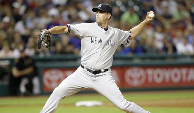 New York Yankees relief pitcher Matt Thornton delivers in the seventh inning of a baseball game against the Cleveland Indians Tuesday, July 8, 2014, in Cleveland. (AP Photo/Tony Dejak)