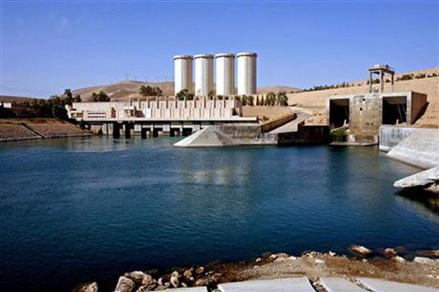 ** FILE **  The advance of the Islamic State of Iraq and the Levant has put Iraq&#39;s Mosul Dam, 360 kilometers (225 miles) northwest of Baghdad at risk. (AP Photo/ Khalid Mohammed, File)