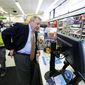 U.S. Sen. Dick Durbin, D-Ill., talks to Walgreens clerk Estella Washington as he shops after a news conference Wednesday, Aug. 6, 2014, in Chicago. Durbin praised Walgreen, the nation&#39;s largest drugstore chain, for declining to pursue an overseas reorganization to trim its U.S. taxes. (AP Photo/M. Spencer Green) **FILE**