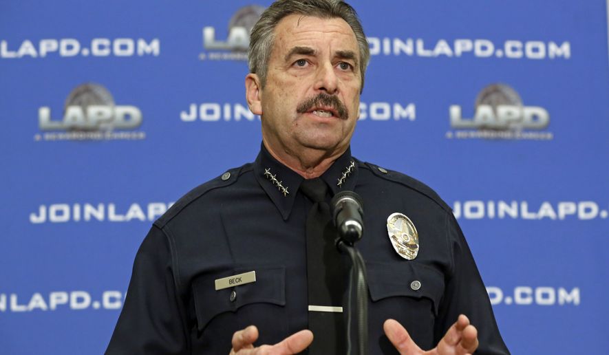 This Feb. 4, 2014, file photo shows Los Angeles Police Chief Charlie Beck speaks at a news conference at LAPD headquarters in Los Angeles. (AP Photo/Reed Saxon, file)