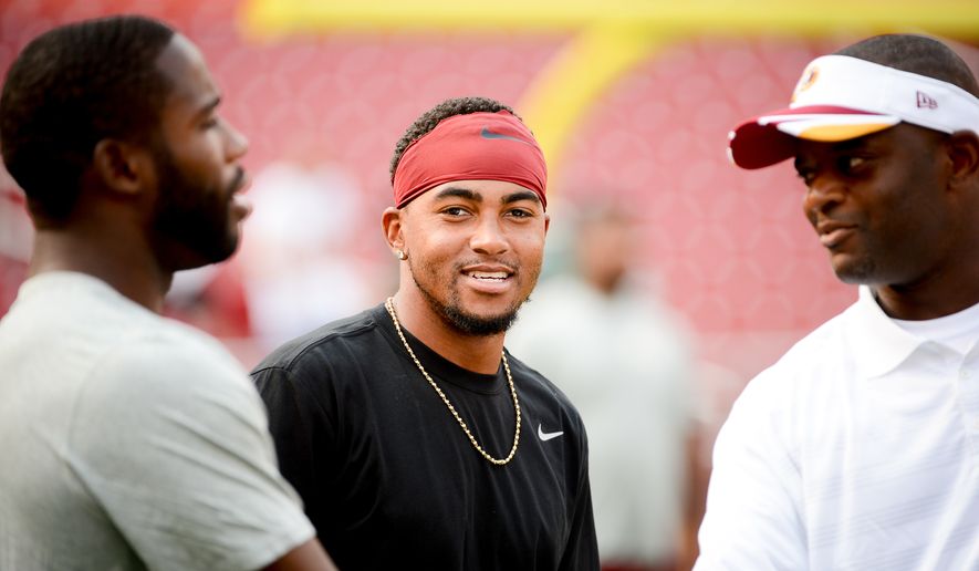 Washington Redskins wide receiver DeSean Jackson (11), center, hangs out on the sideline before the Washington Redskins play the New England Patriots in NFL preseason football at FedExField, Landover, Md.,  Thursday, August 7, 2014. (Andrew Harnik/The Washington Times)Monday, September 9, 2013. (Andrew Harnik/The Washington Times)