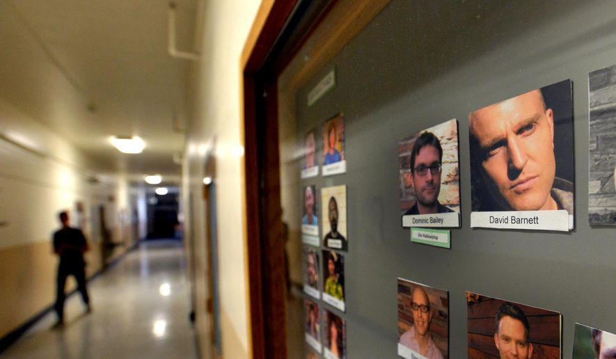 This Thursday, Aug. 7 2014 photo shows a portrait of University of Colorado associate professor David Barnett in the school's philosophy department, in Boulder, Colo. The university is moving to fire the tenured philosophy professor, who launched his own investigation into an alleged sexual assault involving two graduate students. (AP Photo/The Daily Camera, David R Jennings) NO SALES