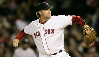 Boston Red Sox starter Curt Schilling delivers a throw during the eighth inning against the New York Yankees at Fenway Park in Boston, Monday, May 22, 2006. (AP Photo/Charles Krupa) ** FILE **