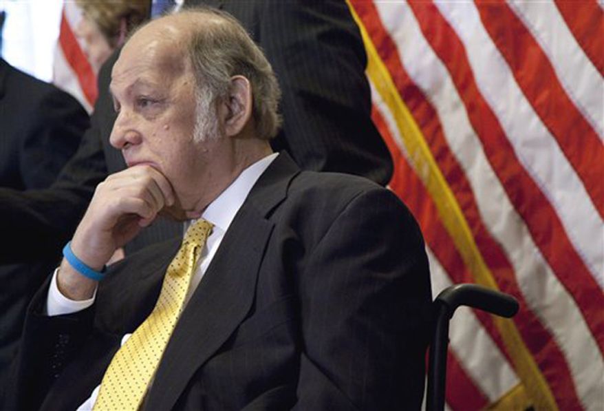 ** FILE ** Former White House press secretary James Brady who was left paralyzed in the Reagan assassination attempt during a news conference on Capitol Hill in Washington marking the 30th anniversary of the shooting. (AP Photo/Evan Vucci, File)