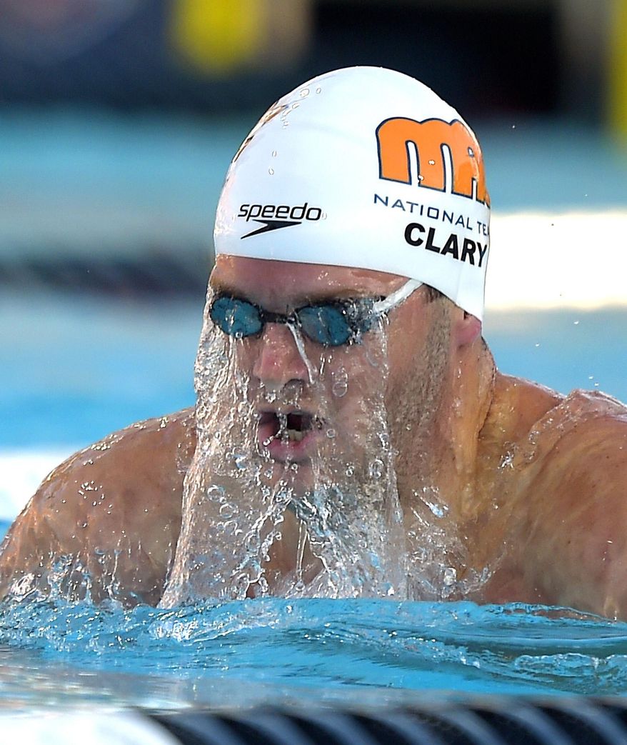 Tyler Clary, right, swims the breaststroke during the men's 400 meter individual medley at the U.S. nationals of swimming, Friday, Aug. 8, 2014, in Irvine, Calif. Clary won the event. (AP Photo/Mark J. Terrill)